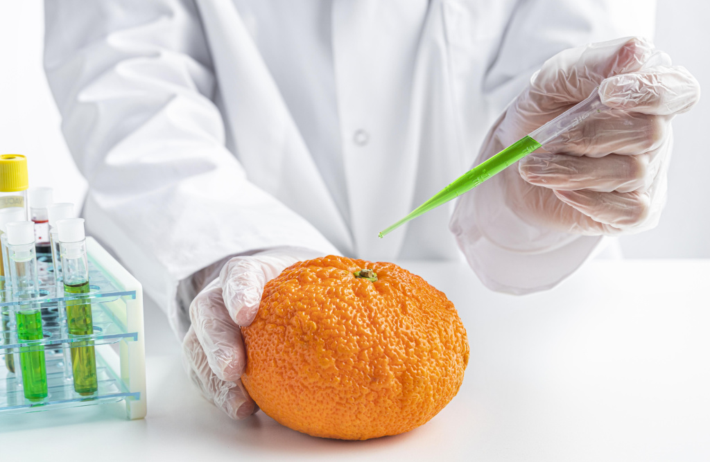 front-view-orange-injected-with-chemicals.jpg